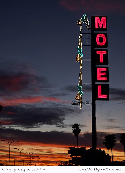 The "diving lady" motel sign from the Starlite Motel in Mesa, AZ. There are three neon shapes of a woman diving, first in a forward fold, then fully extended into her dive.